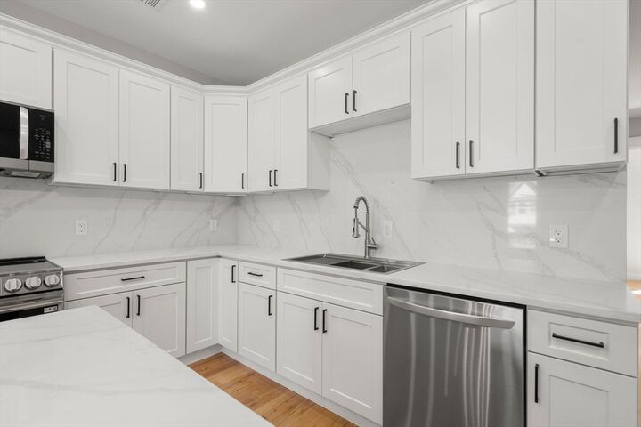 Property Photo:  60 Stanley St 102  MA 02125 