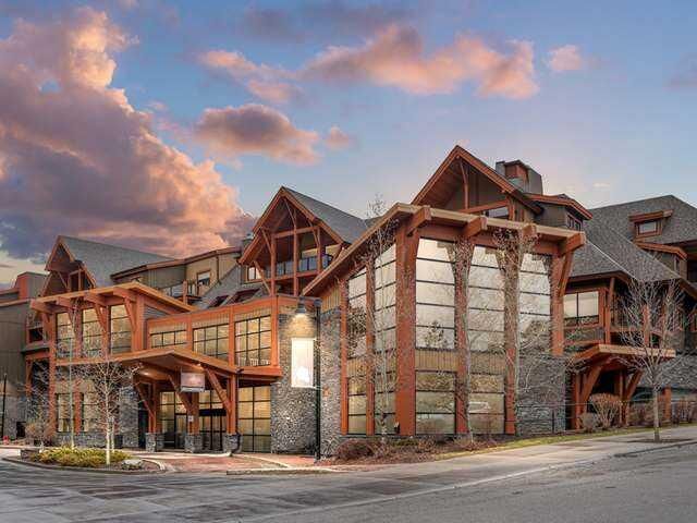 Property Photo: 187 Kananaskis Way 313 AB T1W 0A3