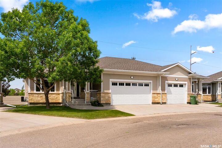 Property Photo:  122 Wintergreene Lane  SK S4S 0A7 