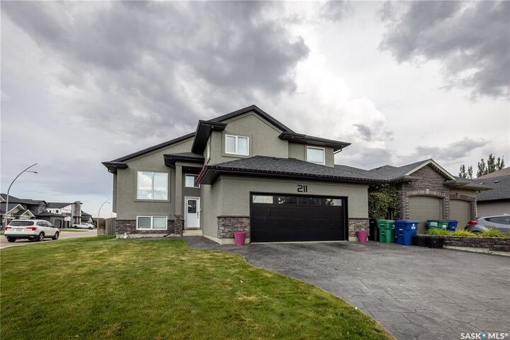 Property Photo: 211 Sauer Crescent SK S7S 1L9