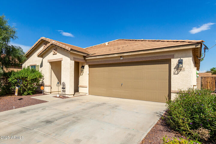 Property Photo: 6910 S 75th Drive AZ 85339