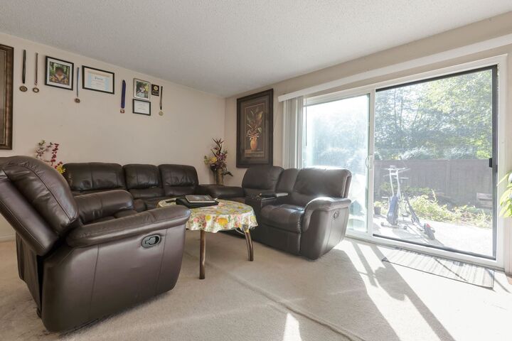 Property Photo:  9473 Prince Charles Boulevard 105  BC V3V 7G1 
