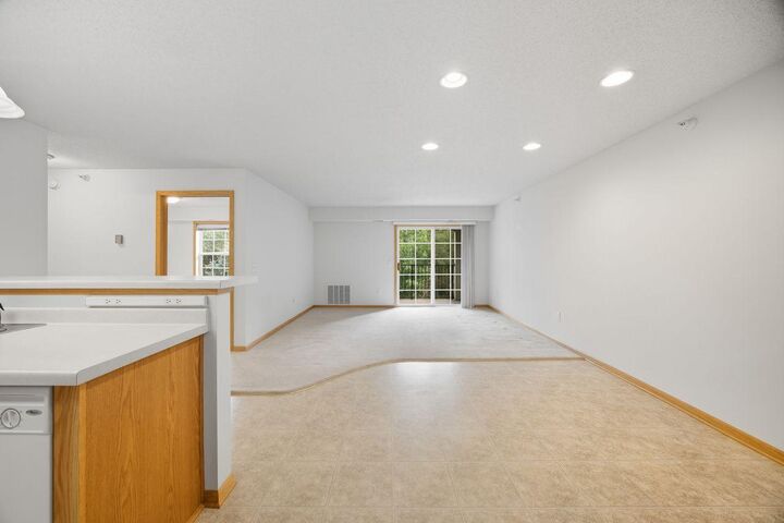 Property Photo:  15631 Linnet Street NW 3-210  MN 55304 