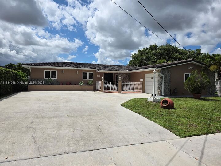 Property Photo: 14760 Lewis Rd 14760 FL 33014