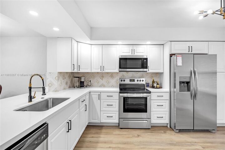 Property Photo: 701 SW 142nd Ave 108S FL 33027