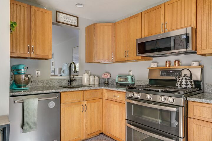 Property Photo:  78 Merrimack Drive  NH 03054 
