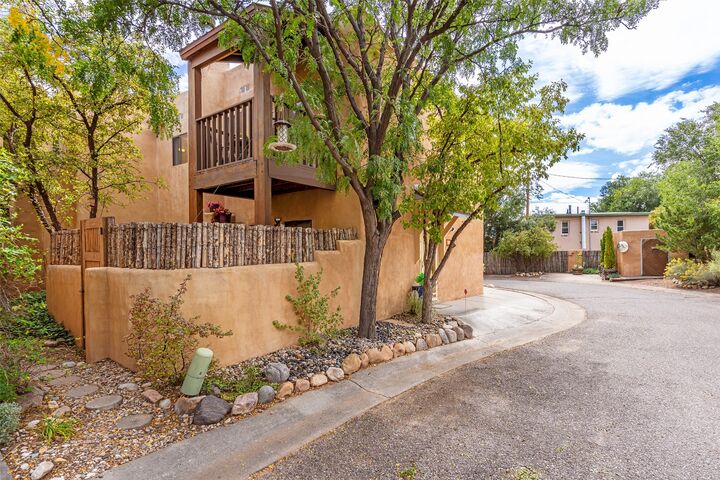 Property Photo:  132 Romero 12  NM 87501 