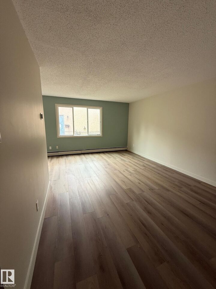 Property Photo:  10035 155 Street NW 1  AB T5P 2L4 