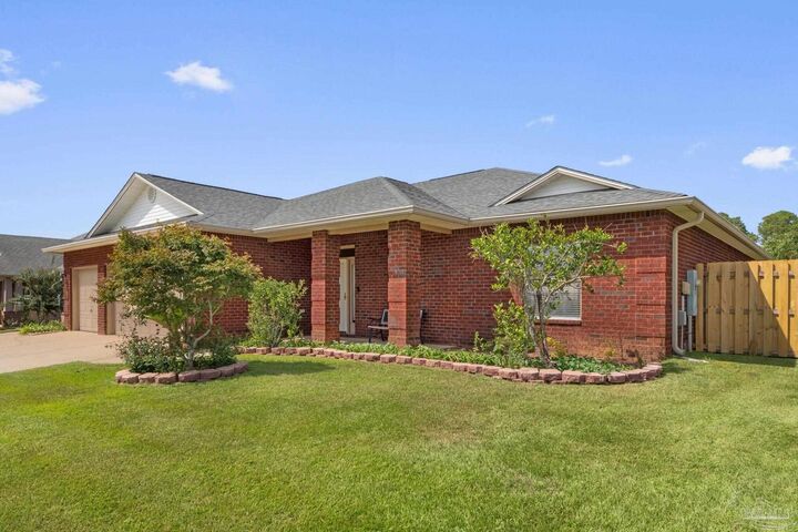 Property Photo:  6018 Patch Ln  FL 32526 