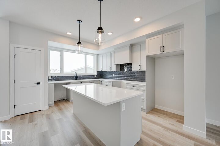 Property Photo: 206 Starling AB T8L 0X9