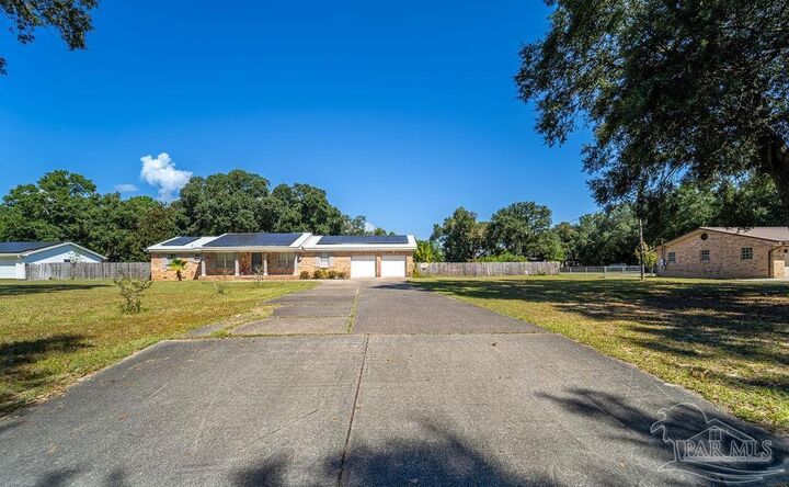Property Photo:  2550 E Burgess Rd  FL 32504 
