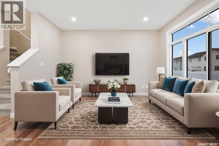 Property Photo:  203 Fortosky Crescent  SK S7M 5X2