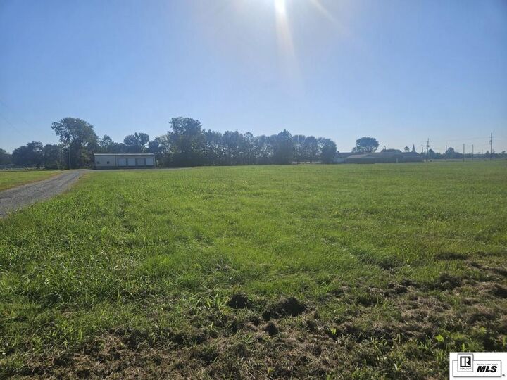 Property Photo:  5651 A Highway 165  LA 71203