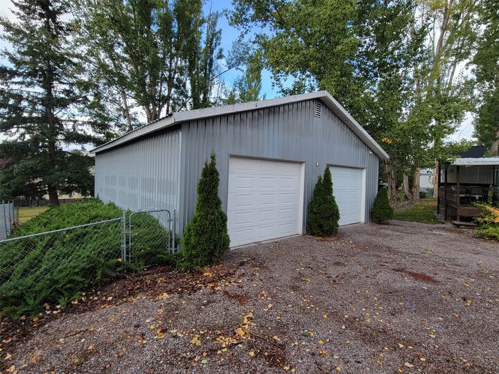 Property Photo:  8245 Pheasant Drive  MT 59808 