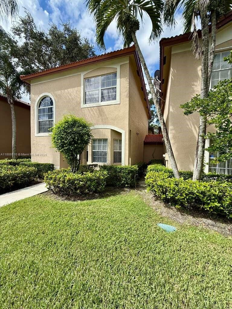 Property Photo: 16111 NE Emerald Cove Rd 16111 FL 33331