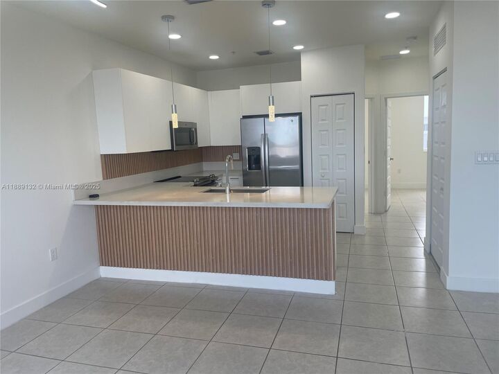 Property Photo:  6455 NW 103rd Pl 304  FL 33178 