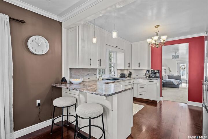 Property Photo:  202 Cambridge Street  SK S6V 2Y3 