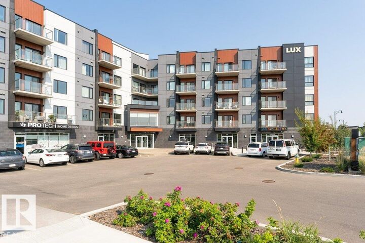 Property Photo:  1316 Windermere Way SW 306  AB T6W 2J3 
