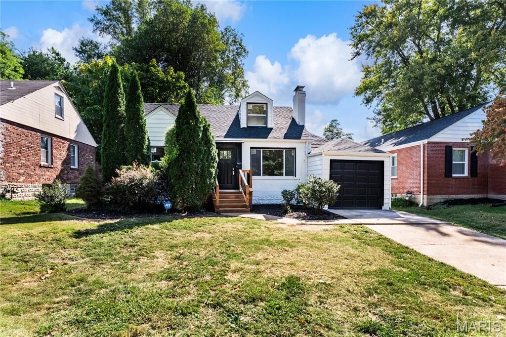 Property Photo:  206 Thoroughman Avenue  MO 63135 