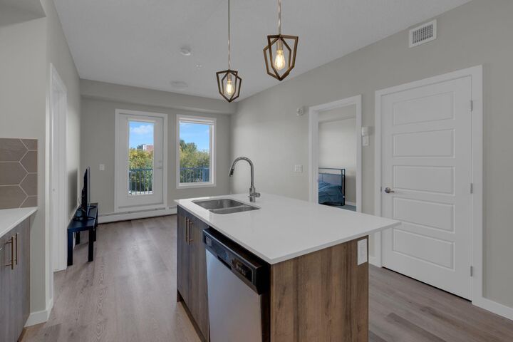 Property Photo:  1605 17 Street SE 221  AB T2G 2L7