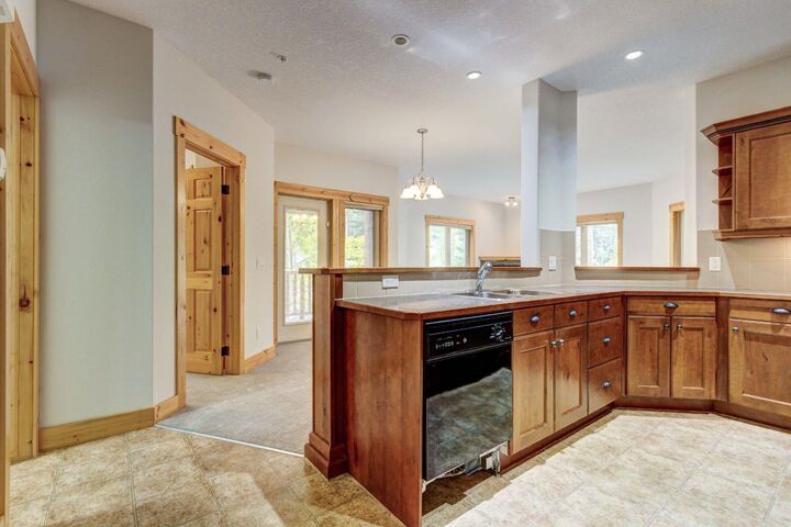 Property Photo:  155 Crossbow Place 215  AB T1W 3H6 