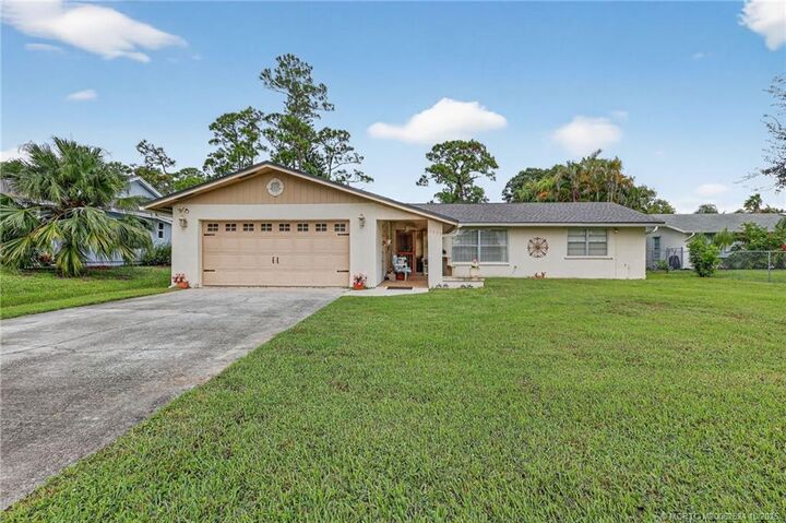 Property Photo:  6299 SE Poinciana Lane  FL 33455 