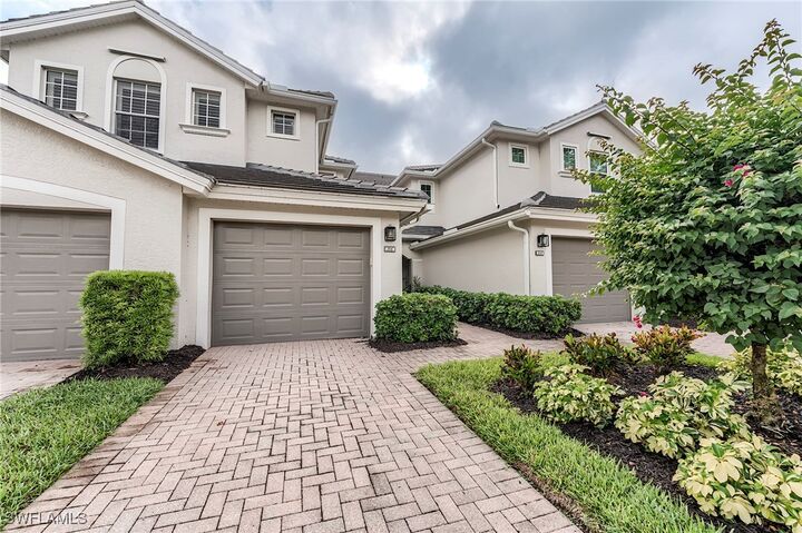 Property Photo:  9111 Palmetto Ridge Drive 201  FL 34135