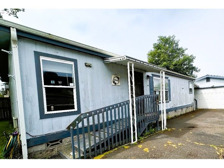 Property Photo:  63780 Wallace Rd  OR 97420