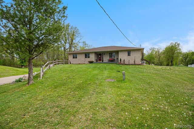 Property Photo:  7031 Munsell Road  MI 48843 