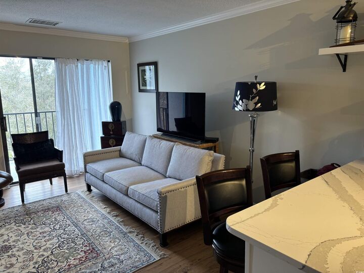 Property Photo:  5001 Little River Rd. E-504  SC 29577 