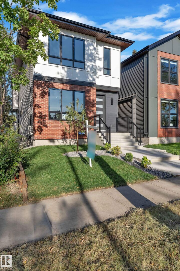 Property Photo: 10725 132 Street NW AB T5M 1C8