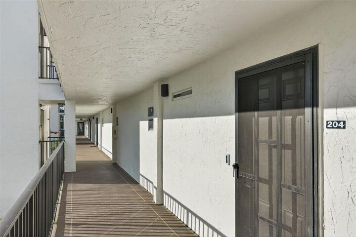 Property Photo: 4540 Gulf Of Mexico Drive 204 FL 34228