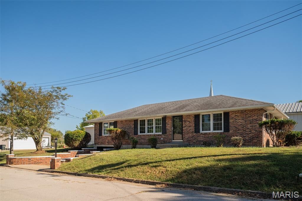 Property Photo: 210 Plum Street MO 65075