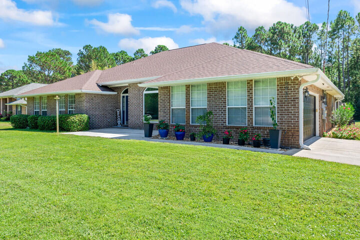 Property Photo: 6985 Flintwood Street FL 32566