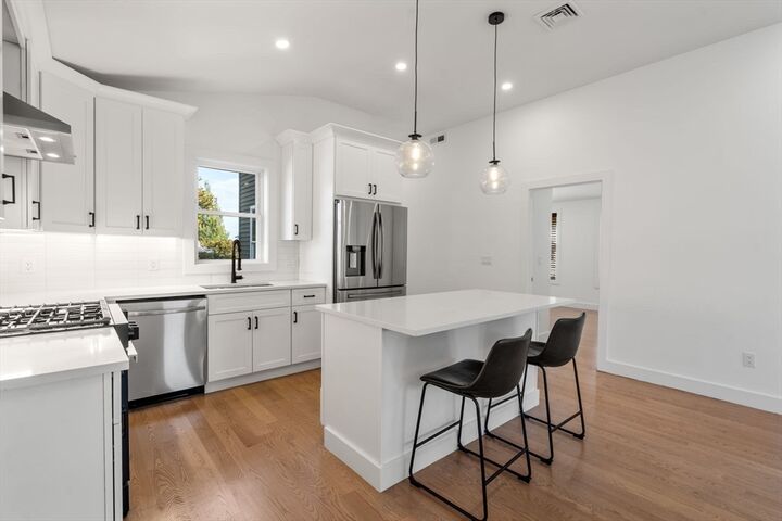 Property Photo: 43-45 Wellington St 3 MA 02451