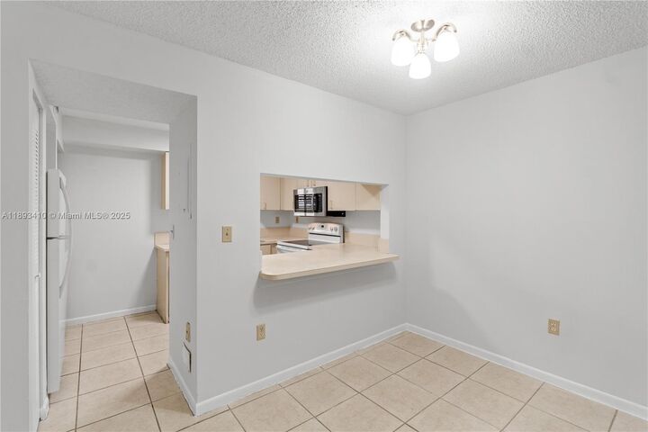 Property Photo: 14900 SW 82nd Ter 14-104 FL 33193