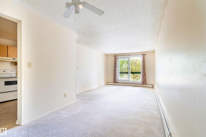 Property Photo: 1628 48 Street NW 203 AB T6L 5P2