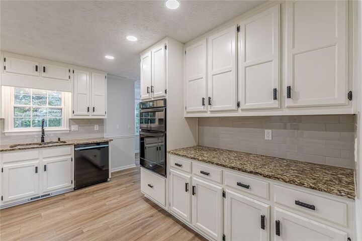 Property Photo:  2011 Old Peachtree Road NW  GA 30097 