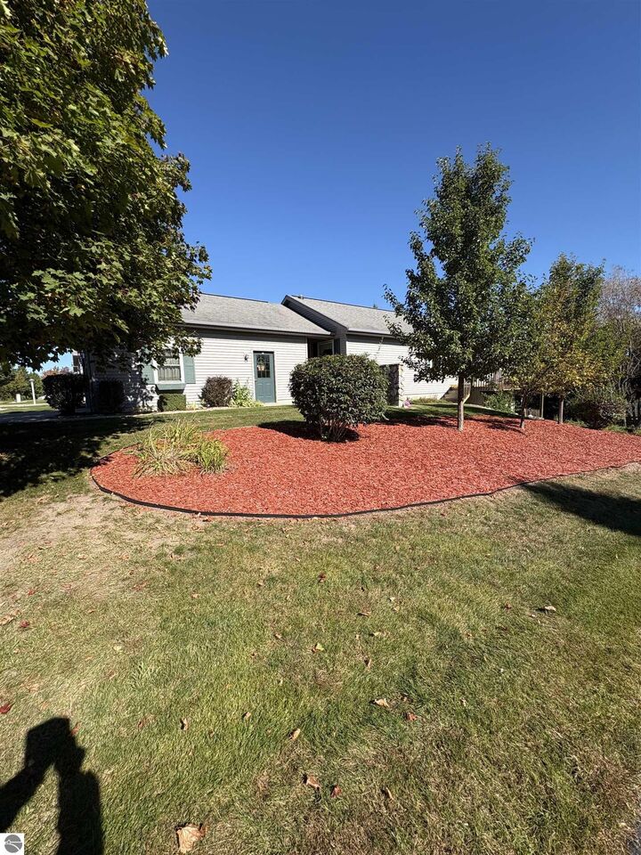 Property Photo:  3702 Creekside Drive  MI 49684 