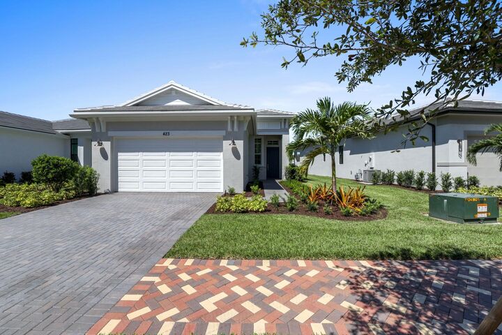 Property Photo:  423 SE Via Sangro  FL 34953