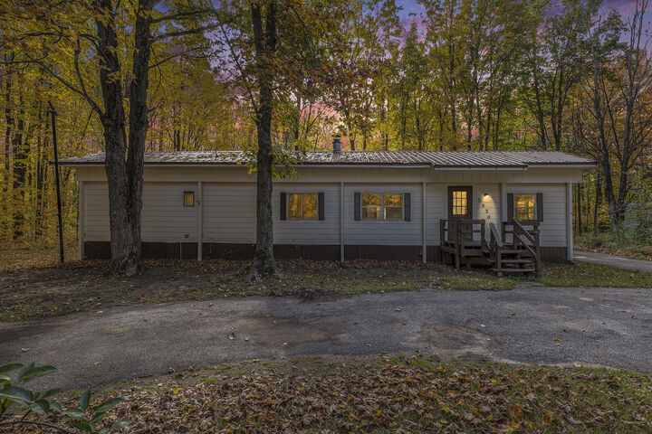 Property Photo:  7830 Larkspur Drive  MI 49659