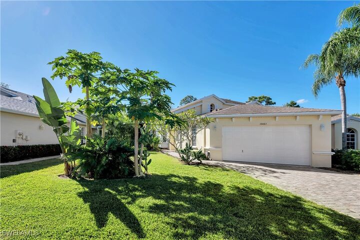 Property Photo: 15063 Sterling Oaks Drive FL 34110