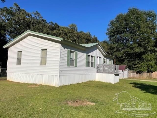 Property Photo: 8583 Cove Ave FL 32534