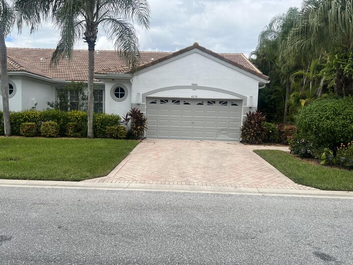 Property Photo: 4638 Carlton Golf Drive FL 33449