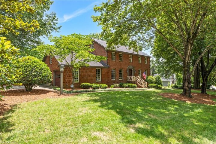 Property Photo:  6001 Muirfield Drive  NC 27410 