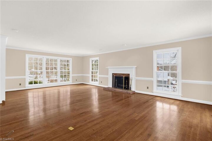 Property Photo:  6001 Muirfield Drive  NC 27410 