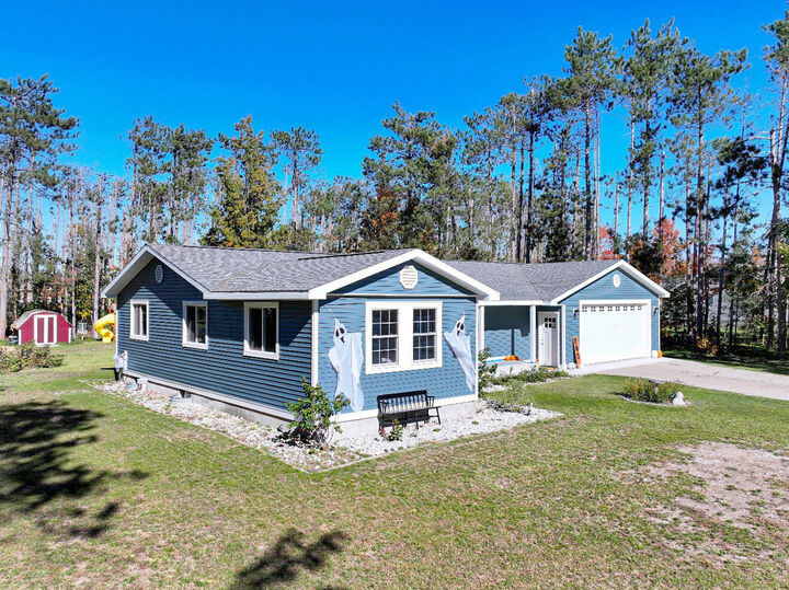 Property Photo:  210 N Estates Drive  MI 49735 