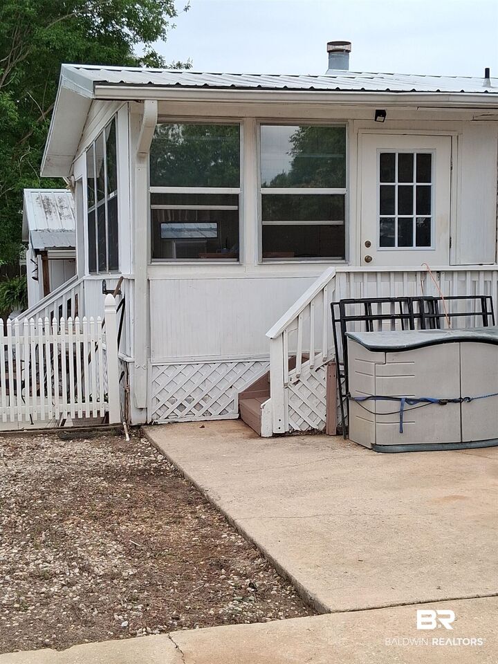 Property Photo: 1887 Suavez Drive AL 36549