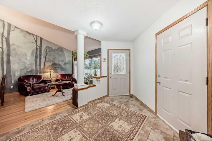 Property Photo: 507 Sheep River Close AB T1S 1S4