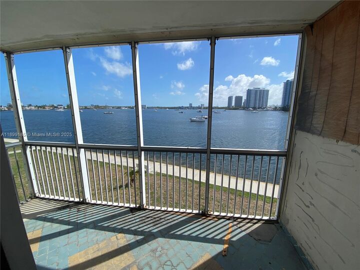 Property Photo:  2920 Point East Dr N311  FL 33160 